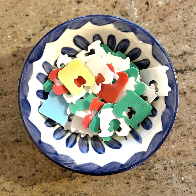 bowl with plastic bread bag fasteners on kitchen counter